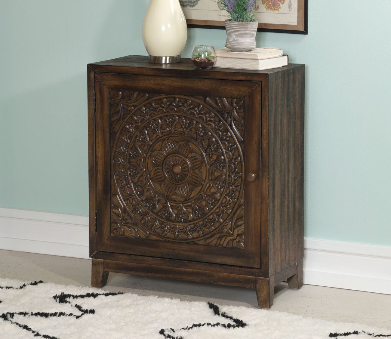 Medallion accent outlet cabinet